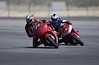 MTC Trackday Streets of Willow 03-23-04

The guy following me nearly highsides twice in front of me, after making a very sketchy pass on cool tires, (one lap in them). After the second near highside, I backed off the pressure. I didn't need any more practice riding around yard sales. I was riding some Dunlop 208 R-something or other, that were complete crap. They began sliding during my second session and continued to get worse and worse as the day wore on. I swapped to Pirelli's the next day and gave the Dunlops away.